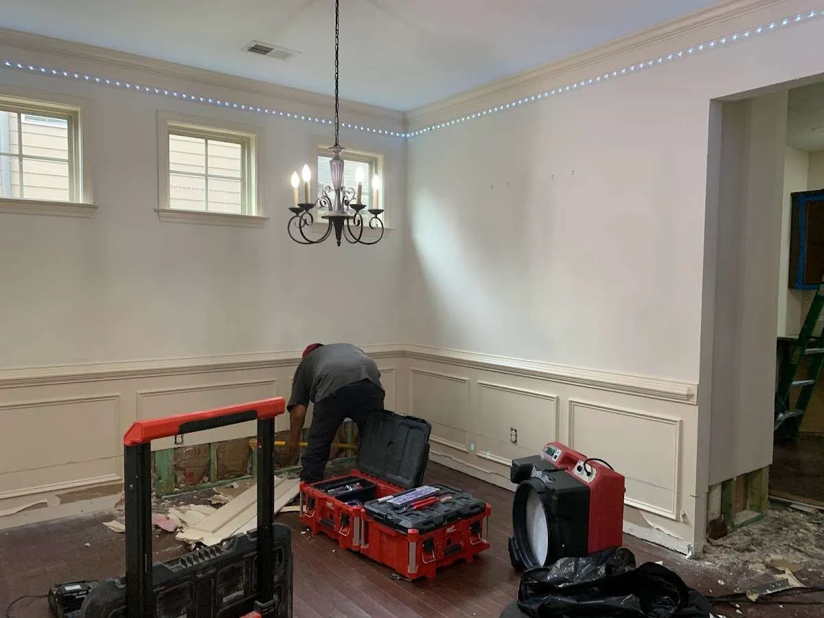 Restoration technician with professional equipment in Wauconda